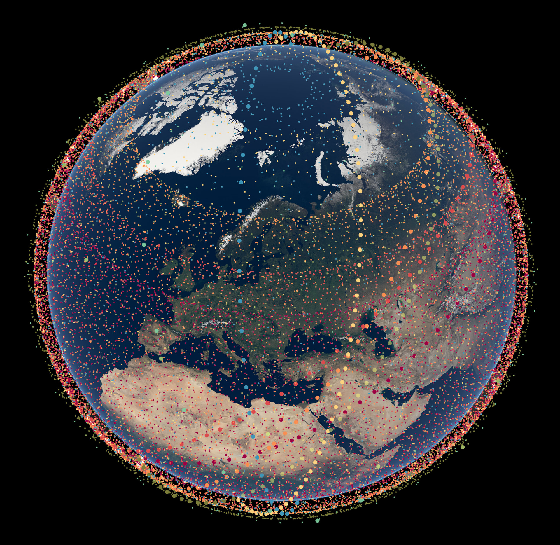 Earth surrounded by a dense cloud of colored dots representing a large satellite constellation in low Earth orbit